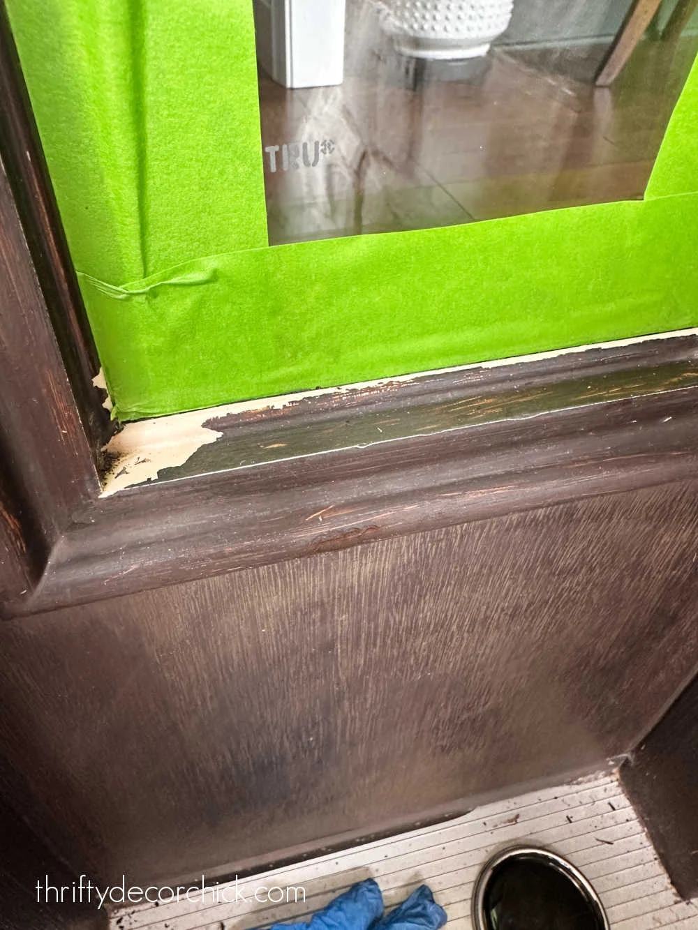 chipped stain on door